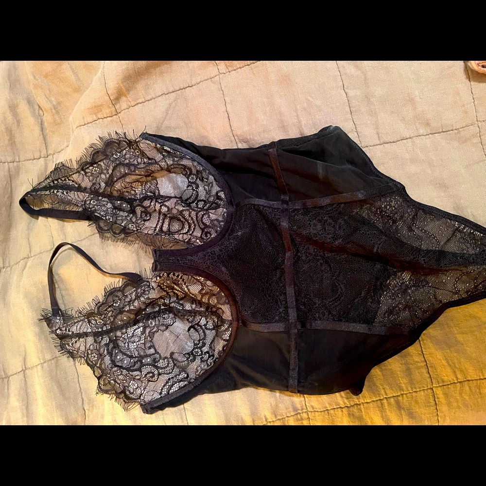 Beautiful wolf + whistle bodysuit, new without tags (never worn)